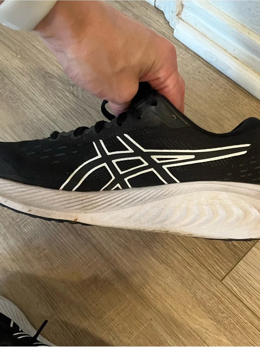 ASICS women’s Black and White Athletic Running Shoes